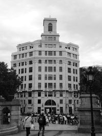 Buildings in city against sky