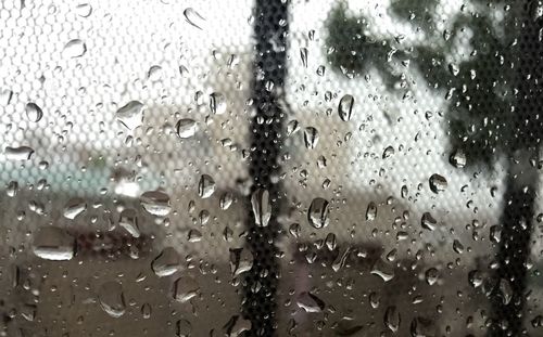 Close-up of water drops on glass