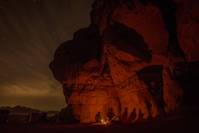 Silhouette of rock formations at night