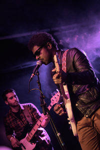 Young man playing guitar