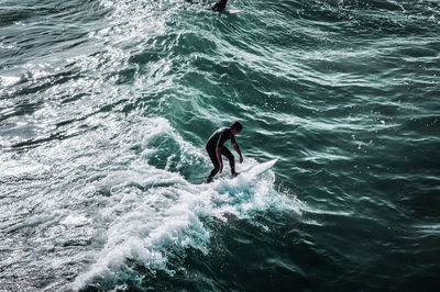 Man surfing in sea