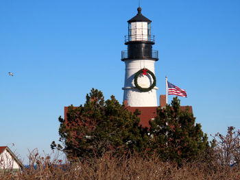 Low angle view of lighthouse against clear sky