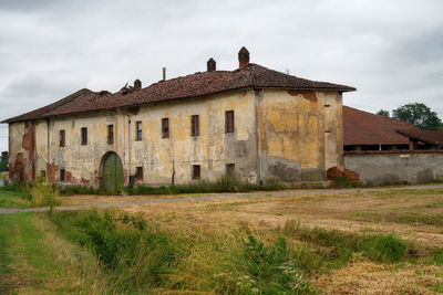 Abandoned building against sky