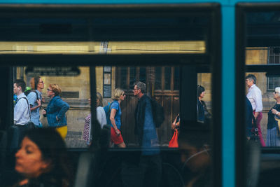 People standing at railroad station platform