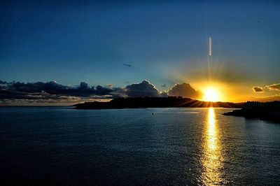 Scenic view of sunset over sea