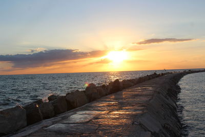 Scenic view of sea against sky during sunset