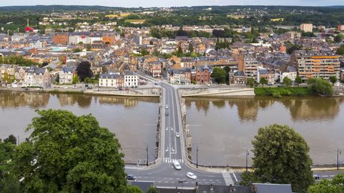 High angle view of river amidst buildings in city