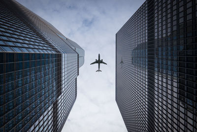 Low angle view of modern buildings against sky