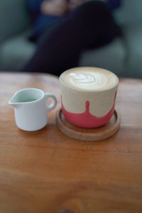 Close-up of coffee cup on table