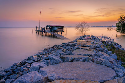 Scenic view of sea against sky during sunset