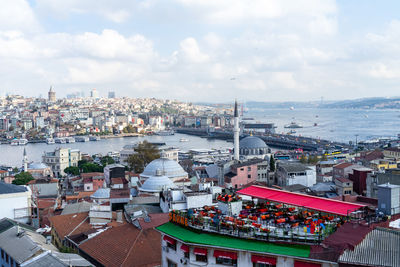 Birds eye view of istanbul's rooftops, galata tower, bosphorus