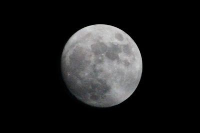 Close-up of moon against clear sky at night