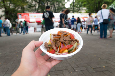 Close-up of hand holding food