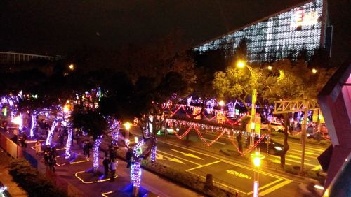 High angle view of illuminated street at night