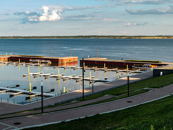 High angle view of road by sea against sky