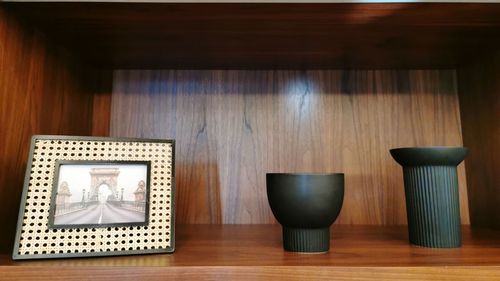 Close-up of illuminated lamp on table at home