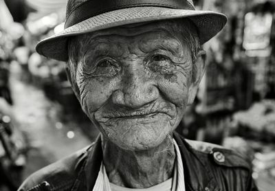 Close-up of senior man standing outdoors