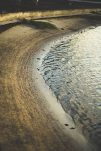 High angle view of wet sand