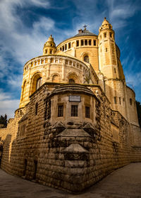 Low angle view of old building against sky