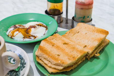 Close-up of breakfast served on table