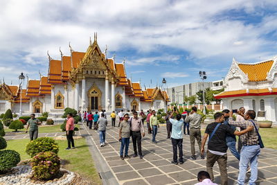 Many muslims visiting the marble temple, it shows that thailand now welcomes all 
 kind of tourists.