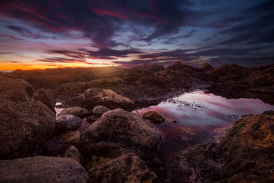 Scenic view of sea against sky during sunset