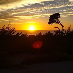 Scenic view of sea at sunset