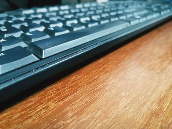 High angle view of computer keyboard on table