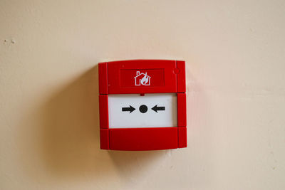Close-up of red symbol on wall