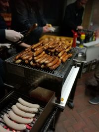 Man preparing food on barbecue grill