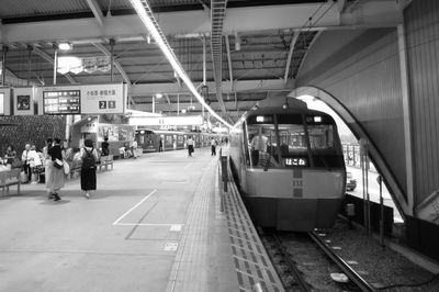 People at railroad station