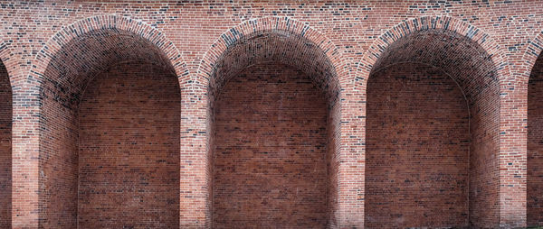 Low angle view of brick wall