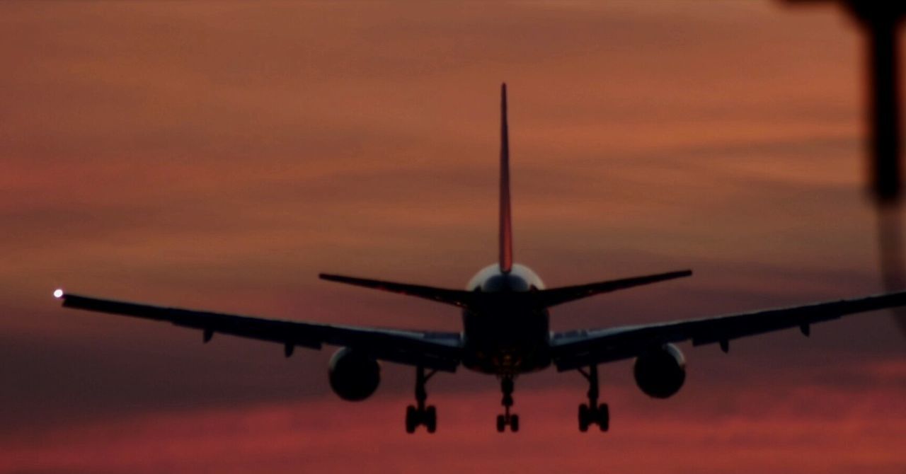 airplane, travel, sunset, air vehicle, commercial airplane, transportation, aerospace industry, landing - touching down, mid-air, no people, sky, airport runway, outdoors, day