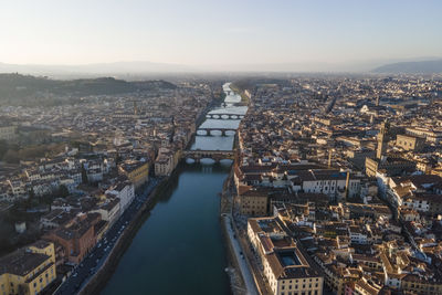 Aerial view of florence along the arno river and the old town from above, tuscany, italy,