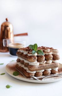 Close-up of cake served on table