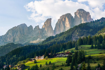 View of mountains against sky in town