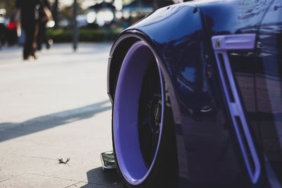 Close-up of vintage car on road