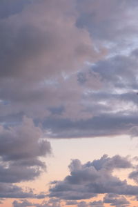 Low angle view of cloudy sky during sunset