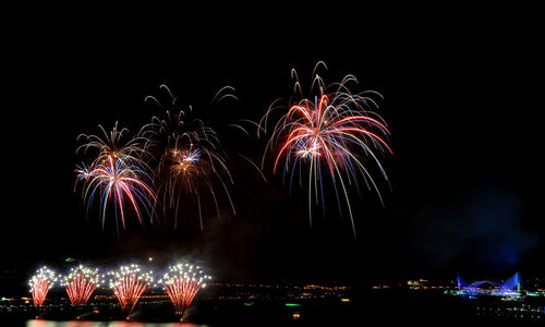 Firework display at night