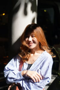 Portrait of a smiling young woman