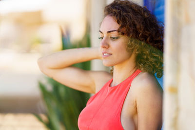 Portrait of young woman looking away