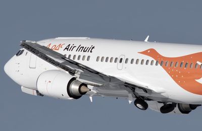 Airplane flying against clear sky