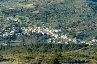 High angle view of buildings on field