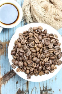 Directly above shot of roasted coffee beans on table