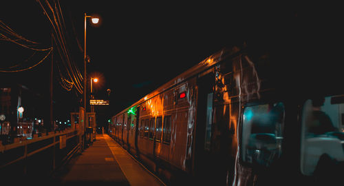 Train against sky at night