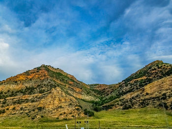 Panoramic view of mountain range against sky