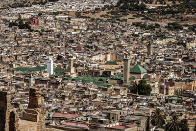 Rooftops of the old medina jewish quarter zaouia moulay idriss ii mosque in fez, morocco, africa.