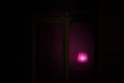 Illuminated curtain at night