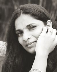 Close-up portrait of young woman