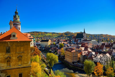 High angle view of townscape against clear blue sky